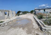 NEIBA: Autoridades y juntas vecinos fortalecen coordinación para posibilitar asfaltado de calles.